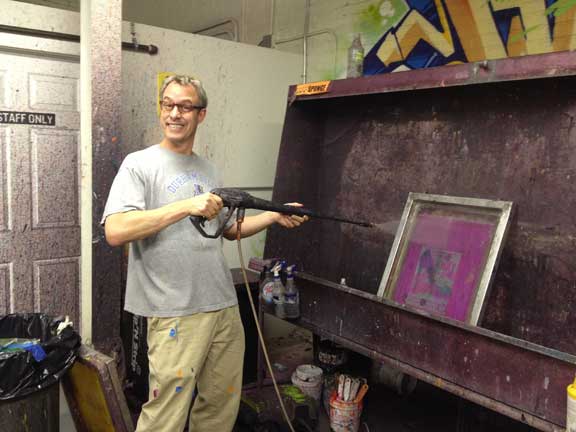 John Tebeau Cleaning Screens! Wheeee!